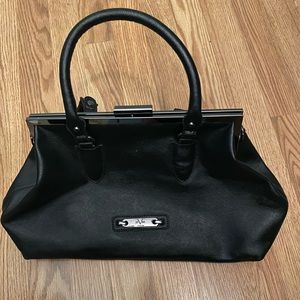 Versace handbag. Vegan. Lightly used. Excellent condition